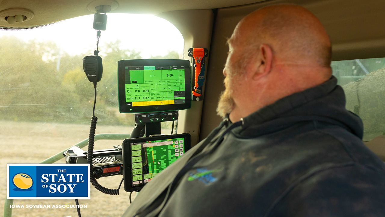 Robb Ewoldt in combine during harvest in Iowa