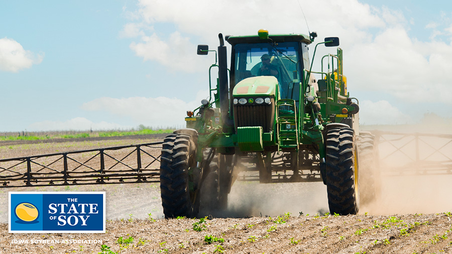 Sprayer in crop field