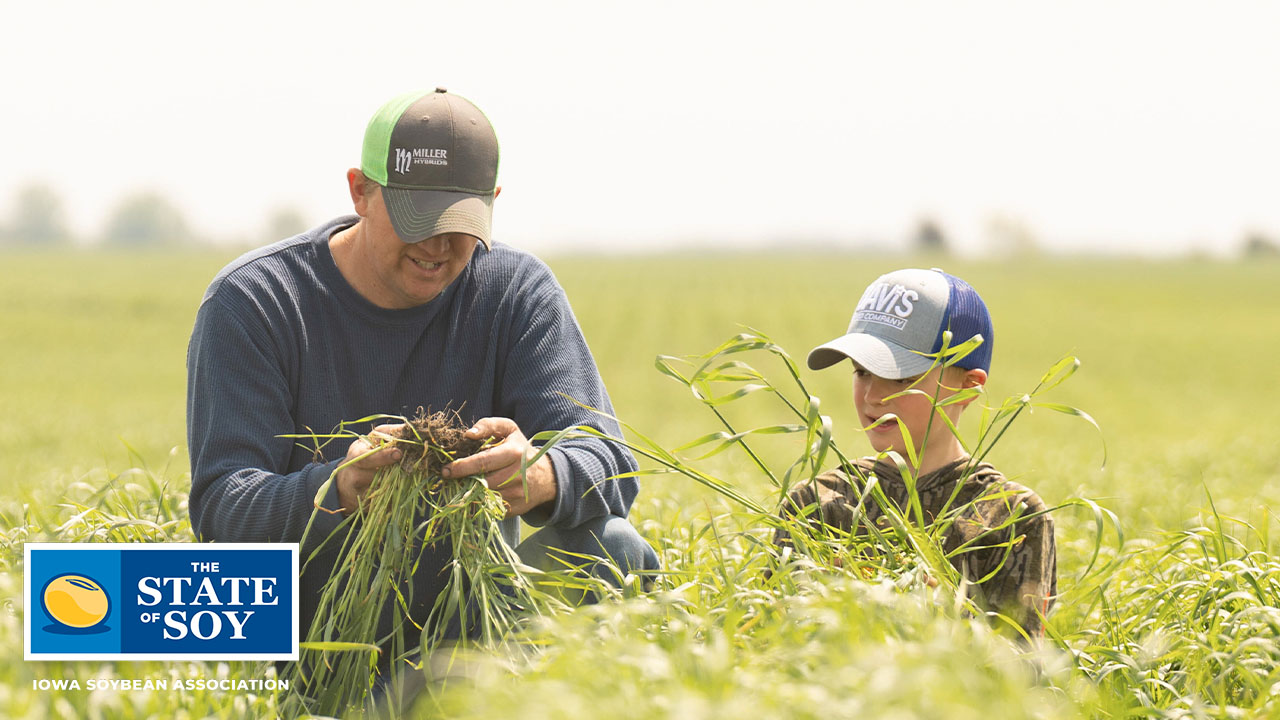 Farmer and his son in field