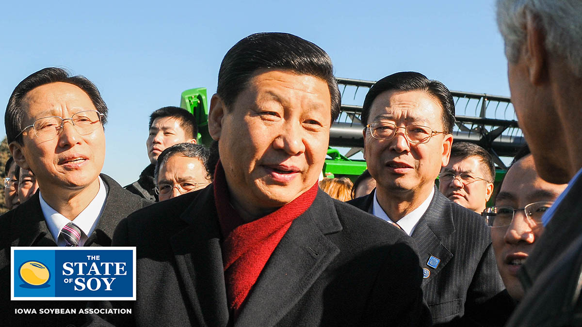 Iowa farmer talking with officials from China.