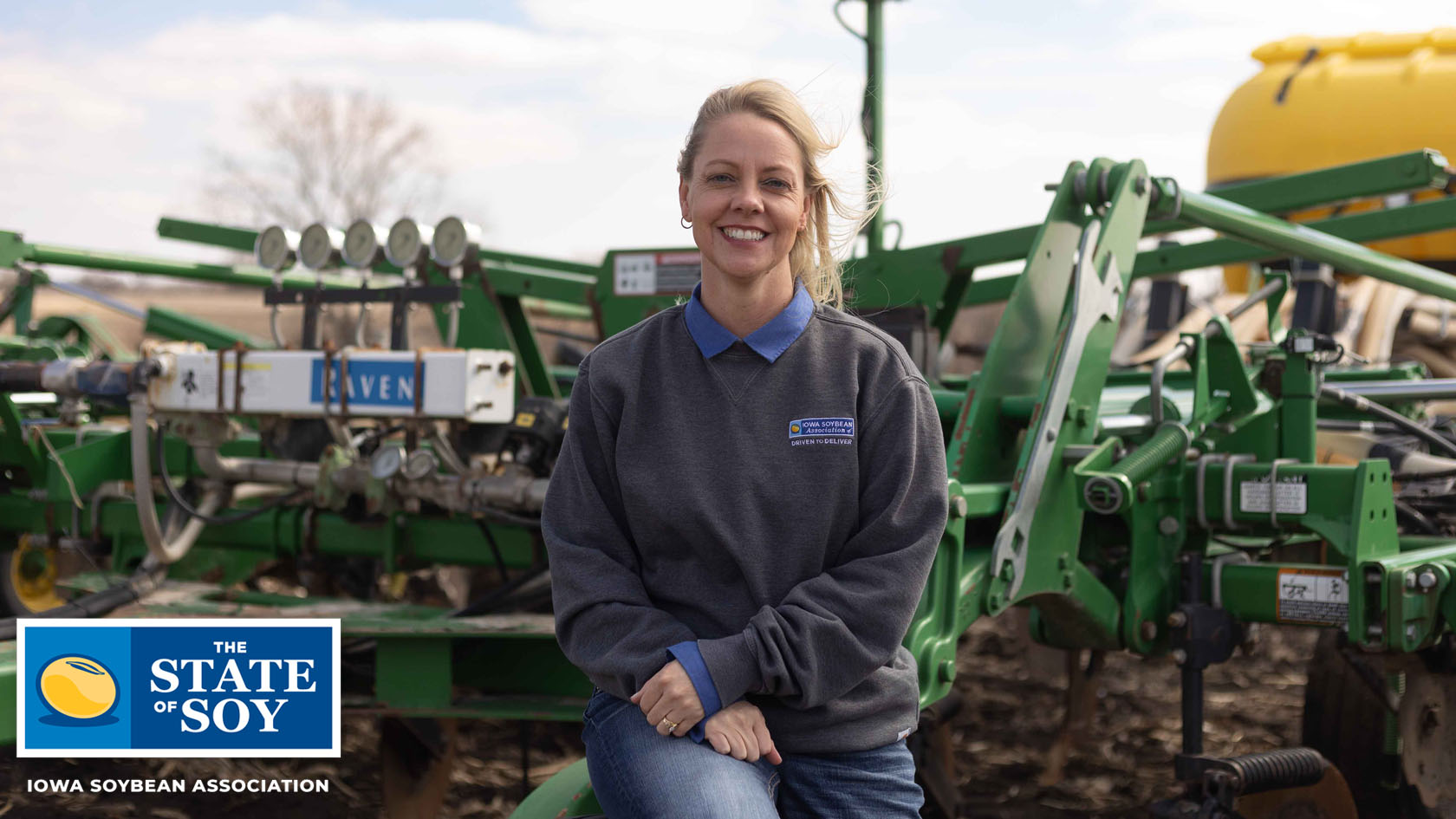 Farmer sits on planter
