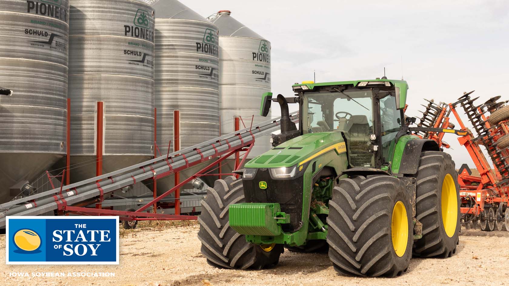 Green tractor with large tires