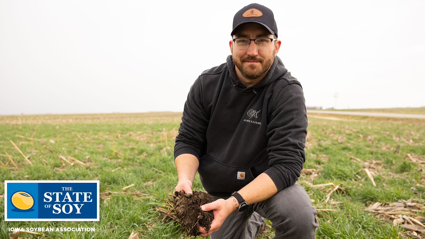 Farmer Holds Cover Crop Root Ball with Soil