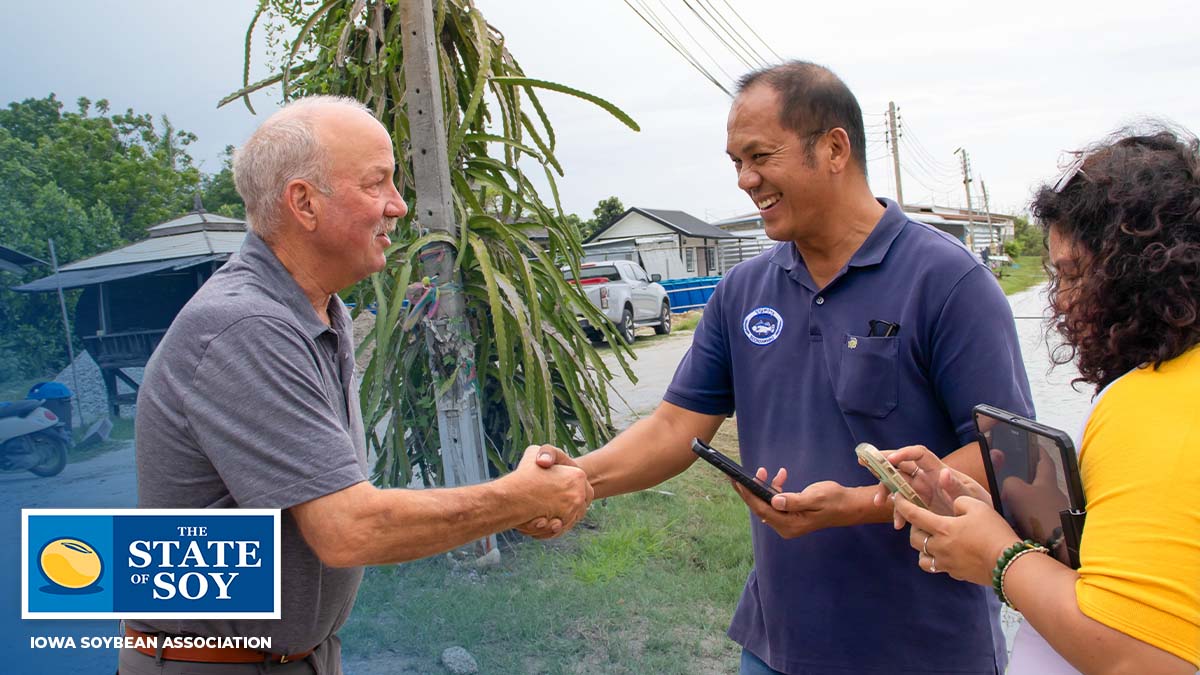 Iowa soybean farmer shaking hand in Thailand