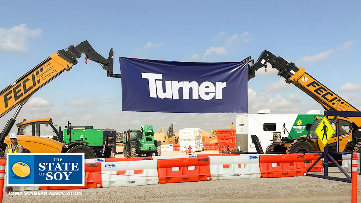 Turner Construction banner held up by lifts