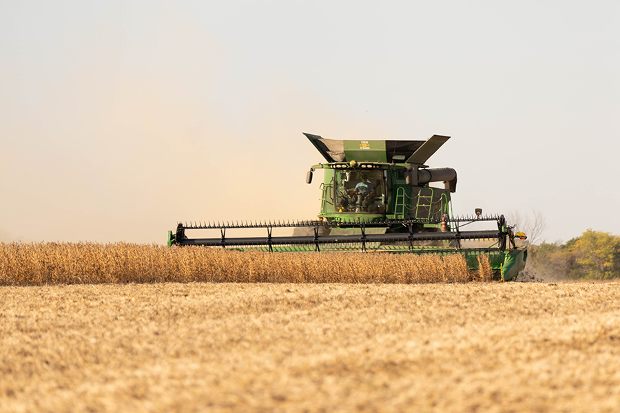 John Deere Combine in soybean field