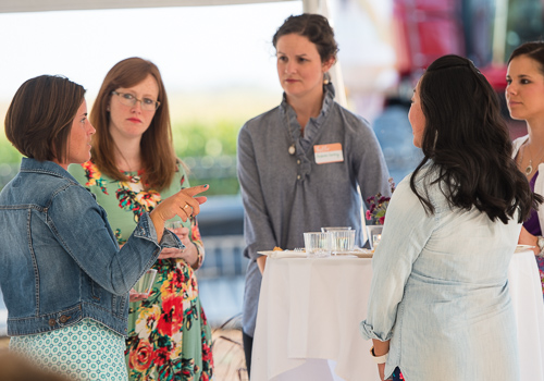 ISA CommonGround volunteers converse with consumers.
